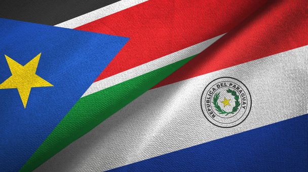 South Sudan and Paraguay two flags textile cloth, fabric texture - Photo, Image