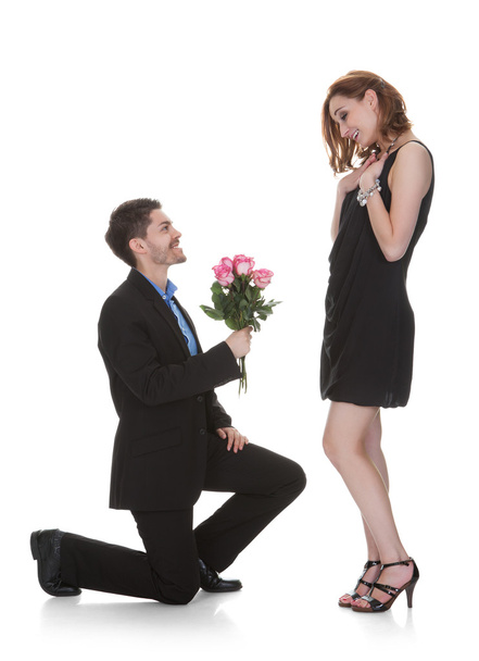 Man Offer Flower To Beautiful Woman - Foto, Imagem