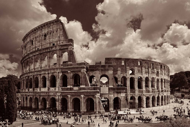 Colosseum in a cloudy day, the world known landmark and the symbol of Rome, Italy. - Photo, Image