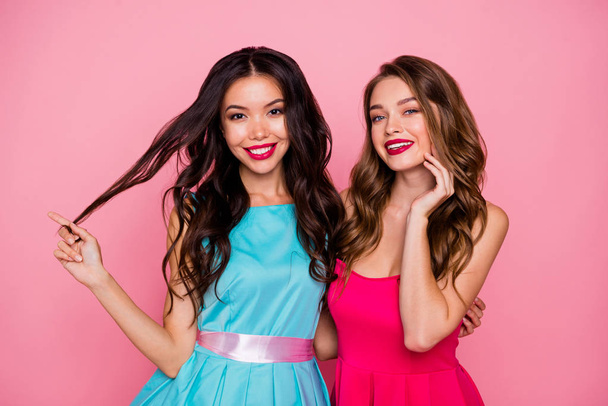 Close up photo two beautiful she her ladies graduation classy hugging playful coquettish adorable wear pretty nice cute shiny colorful dresses formal-wear isolated pink rose vivid background - Foto, Imagem