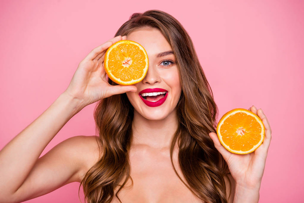 Close up photo beautiful amazing she her lady arms two orange slices hide one eye perfect allure lips natural body care useful influence wear no clothes naked nude isolated pink bright background - Φωτογραφία, εικόνα