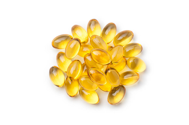 Pile of fish oil capsules isolated on white background. Top view. - Photo, Image