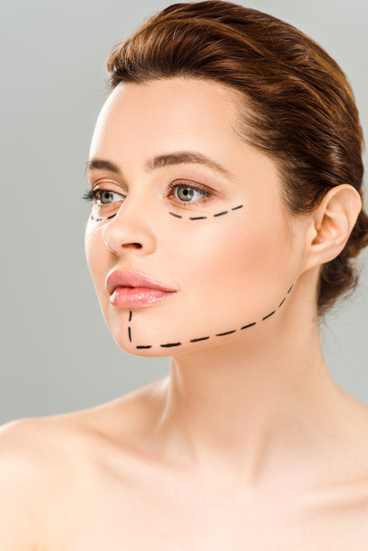 naked and beautiful woman with marks on face isolated on grey  - Photo, Image
