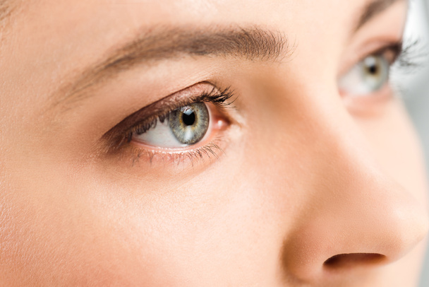 cropped view of woman with eye shadows on eyes looking away  - Photo, Image