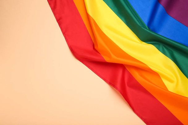 Rainbow flag on beige background - Photo, Image