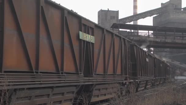 Movement by rail railway wagons loaded with coal at the plant - Footage, Video