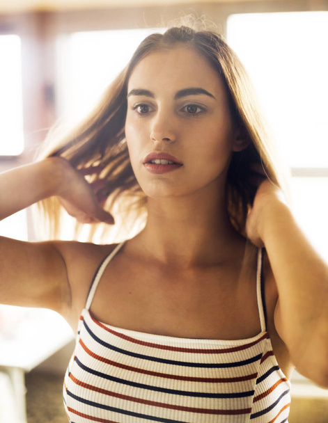 Portrait of young woman in striped summer dress  - Φωτογραφία, εικόνα
