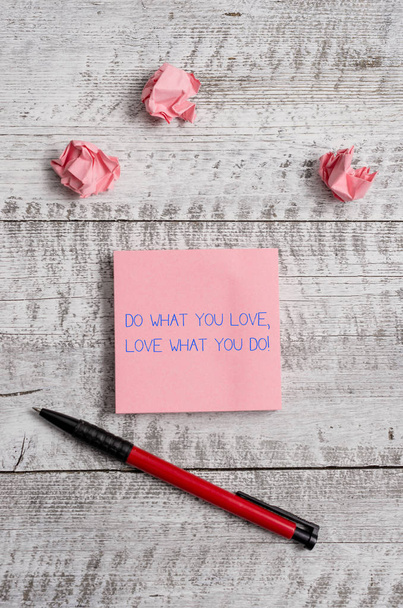 Conceptual hand writing showing Do What You Love Love What You Do. Business photo showcasing you able doing stuff you enjoy it to work in better places then Stationary and paper scraps with sheets on - Photo, Image
