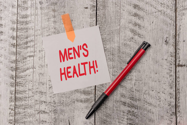 Men S Health'i gösteren bir metin işareti. Tam fiziksel zihinsel ve sosyal iyi olmanın kavramsal fotoğraf durumu analiz bir düz boş kağıt levha ve ahşap dokulu tablo ile bağlı bir kalem. - Fotoğraf, Görsel