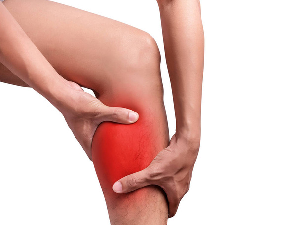 man suffering from leg pain, calf pain. red color highlight at calf, leg isolated on white background. health care and medical concept - 写真・画像