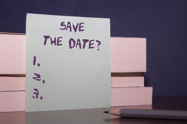 Text sign showing Save The Date question. Conceptual photo asking someone to remember specific day or time Close up three wooden different sizes rectangle boxes paper sheet pencil. - Photo, Image