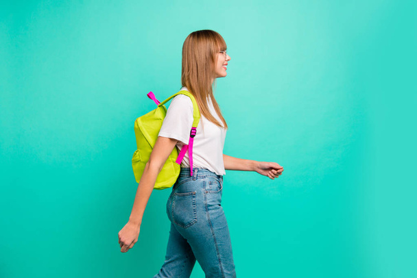 Close up side profile photo beautiful funny she her lady modern backpack going meet classmates groupmates before classes lessons wear specs casual white t-shirt isolated teal green background - Foto, afbeelding