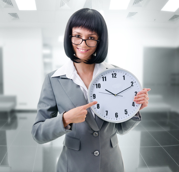 office worker holding big clock - Foto, Imagem