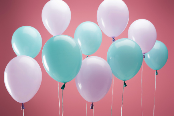 bright party multicolored balloons on pink background - Photo, Image