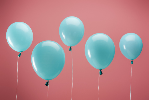 festive party decorative balloons on pink background - Φωτογραφία, εικόνα