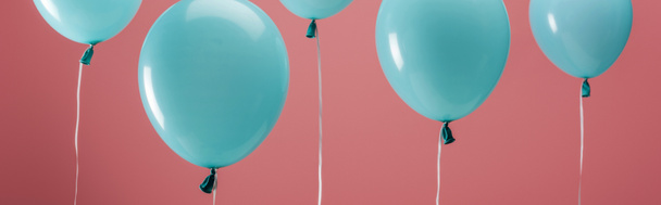 festive party decorative balloons on pink background, panoramic shot - 写真・画像