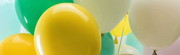close up view of multicolored decorative balloons, panoramic shot - Foto, Imagem