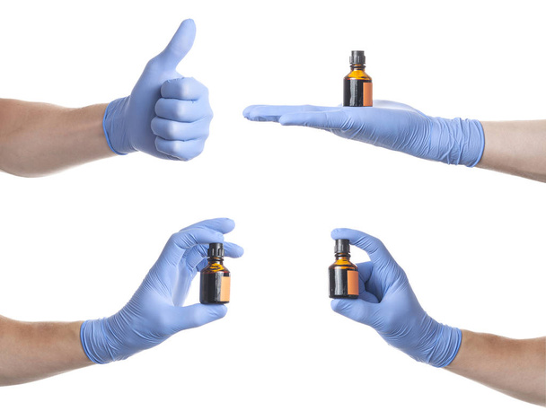 Hands of a medic wearing a blue latex gloves - Фото, зображення