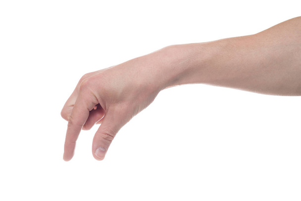 Пустая мужская рука делает жест, как держа что-то изолированное о
 - Фото, изображение