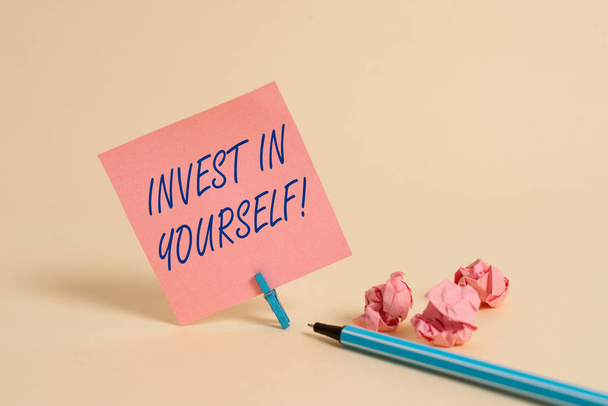 Conceptual hand writing showing Invest In Yourself. Business photo showcasing learn new things or materials thus making your lot better. - Photo, Image