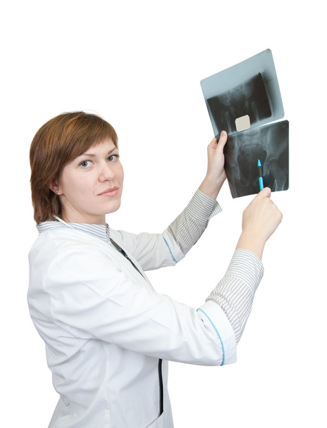 Female doctor looking at an x-ray - Фото, зображення