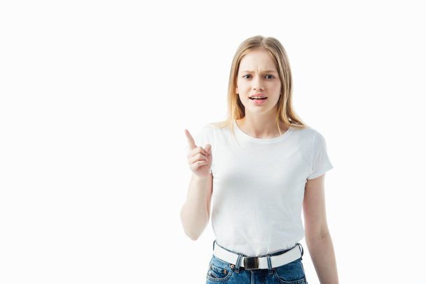 angry upset teenage girl pointing with finger isolated on white - Foto, Imagen