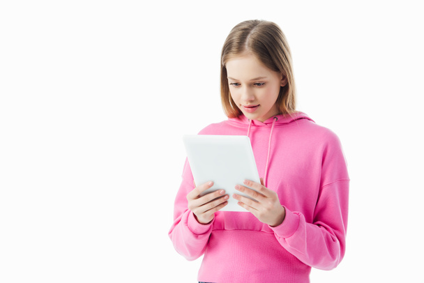 smiling teenage girl using digital tablet isolated on white - Foto, afbeelding