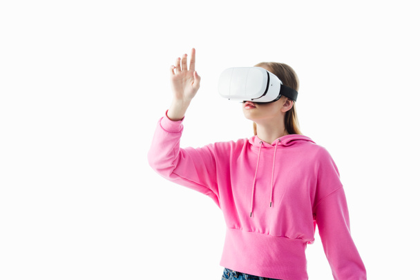 teenage girl in pink hoodie wearing vr headset and gesturing isolated on white - Photo, image