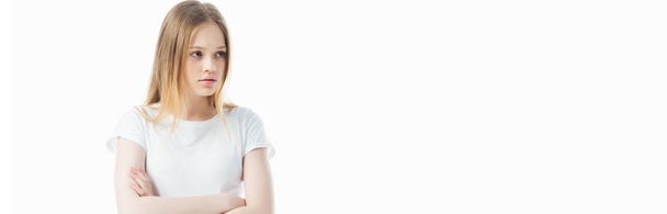offended teenage girl with crossed arms looking away isolated on white, panoramic shot - Photo, Image