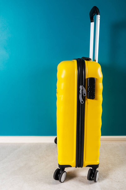 Bright and stylish cabin size suitcase as holiday concept - Photo, Image