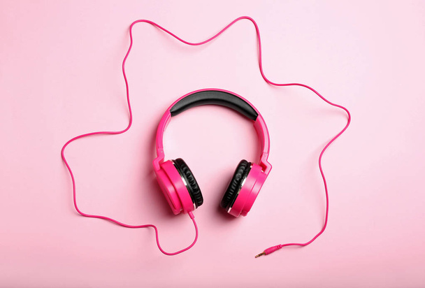 Stylish headphones on color background, top view - Fotoğraf, Görsel