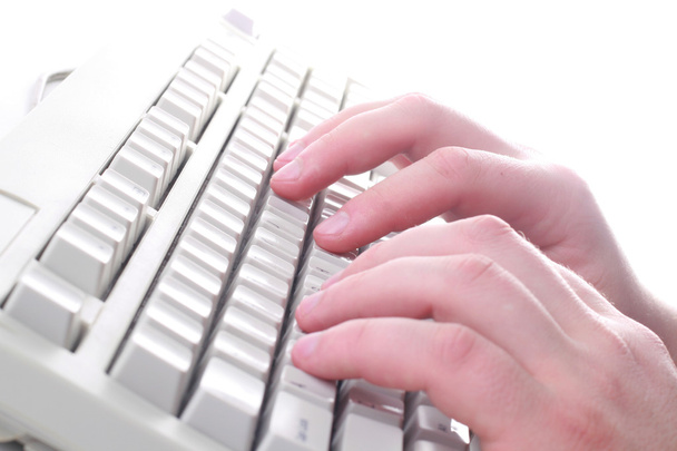 Close-up of hand touching computer keys - Photo, Image