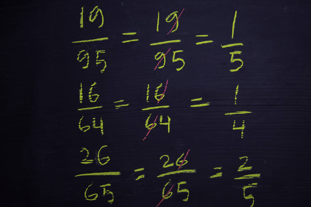 Close up math formulas written on a blackboard. Education concept - Foto, immagini