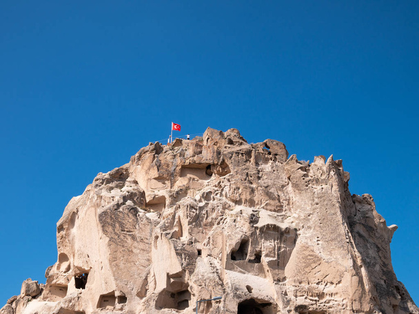 Uchisar Castle in Cappadocia Region of Turkey. - Foto, afbeelding