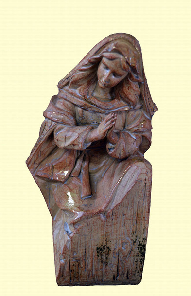virgem esculpida em madeira rezando
 - Foto, Imagem