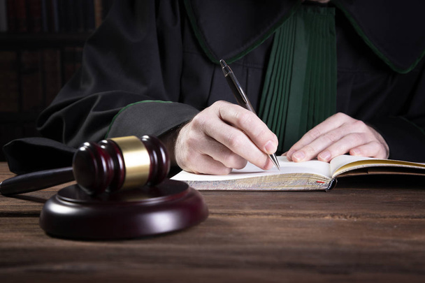 Judge signing crime sentence - Photo, Image