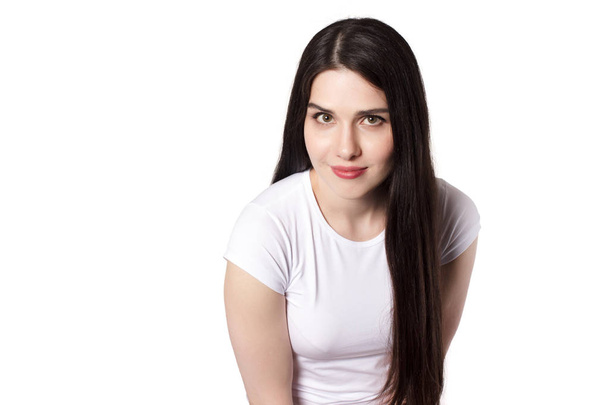 Attractive emotional young woman with a white t-shirt isolated - Fotoğraf, Görsel