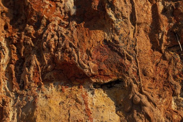 Roca sedimentaria arenosa multicolor. Lugares en el sur de Europa
. - Foto, imagen