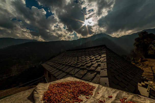 Traditional house and red chilies in himalayas - Photo, Image