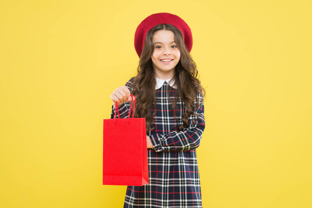 Explore fashion industry. Favorite brands and hottest trends. Girl with shopping bag. Shopping and purchase. Black friday. Sale discount. Shopping day. Child hold package. Kids fashion. Birthday girl - Foto, Imagen