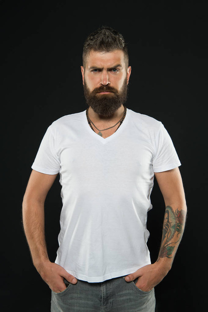 Styling and trimming beard care. Bearded confident hipster. Beard fashion and barber concept. Man handsome hipster stylish beard and mustache. Beauty and masculinity. Barber tips maintain beard - Foto, afbeelding