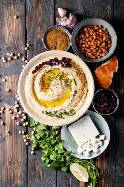 Hummus with olive oil and ground cumin - Valokuva, kuva
