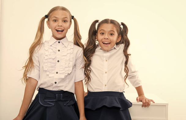 Back to school is here. Little girls happy to be back to school. happy little girls. - Foto, imagen