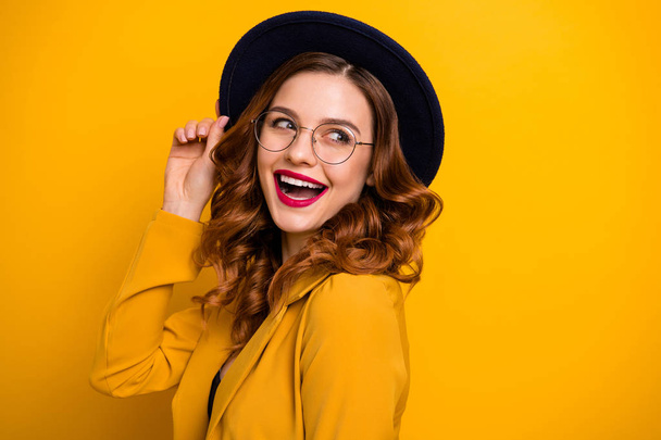 Close-up portrait of her she nice charming cute attractive lovely adorable winsome fascinating chic cheerful wavy-haired lady wearing yellow blazer isolated on bright vivid shine orange background - Photo, Image