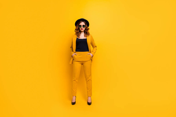 Full length body size photo beautiful amazing she her lady street perfect look tourism traveler not smiling hands arms pockets wear specs formal-wear costume suit isolated yellow bright background - Fotó, kép