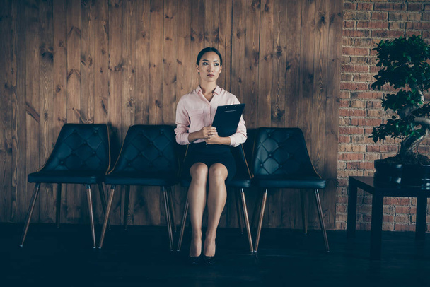 Portrait of her she nice-looking attractive serious content lady shark sitting on chair ready for meeting at modern industrial loft interior style work place station - Foto, Imagen