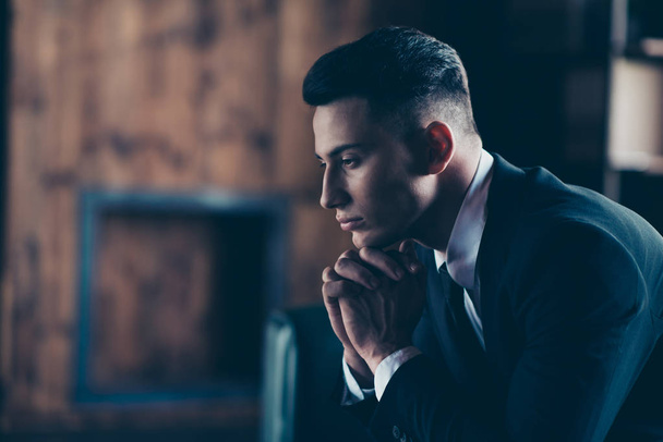Close up side profile photo handsome moody he him his pensive ponder hands arms hold head chin not smiling self-confident wear formal-wear shirt jacket tie suit costume indoors modern office place - Fotoğraf, Görsel
