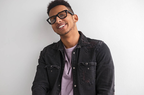 Cheerful black male in trendy glasses - Foto, imagen