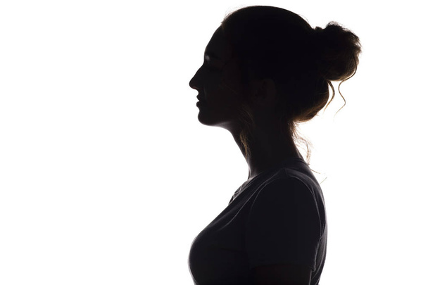 silhouette profile of beautiful girl on a white isolated background - Φωτογραφία, εικόνα