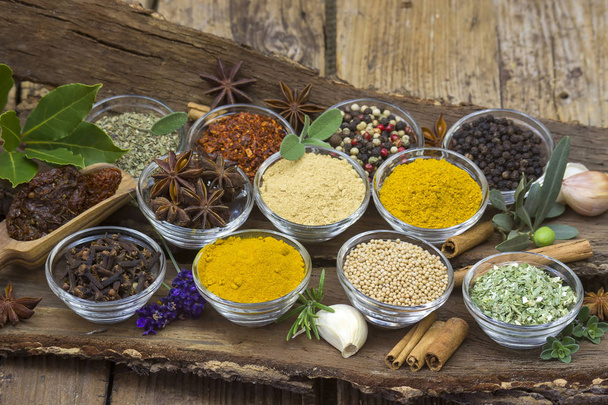 Variety of spices on wooden background - Photo, Image